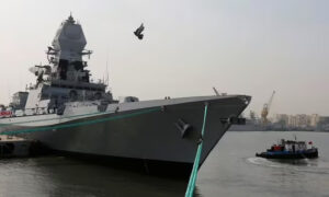 Indian naval warship reaches hijacked vessel, issues warning to pirates