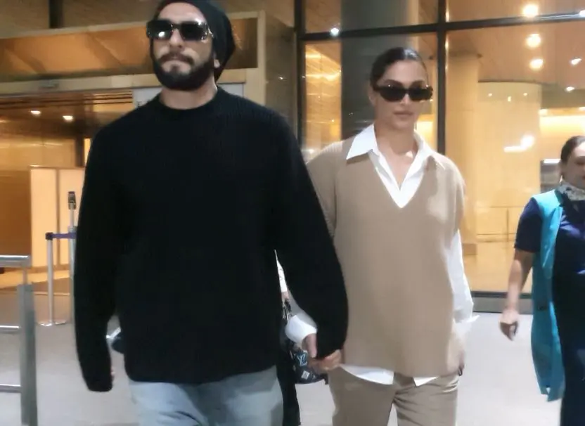 Ranveer Singh, Deepika Padukone walk hand-in-hand as they get clicked at airport