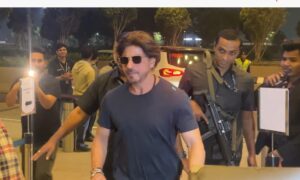 SRK sports ponytail look as he gets snapped at Mumbai airport