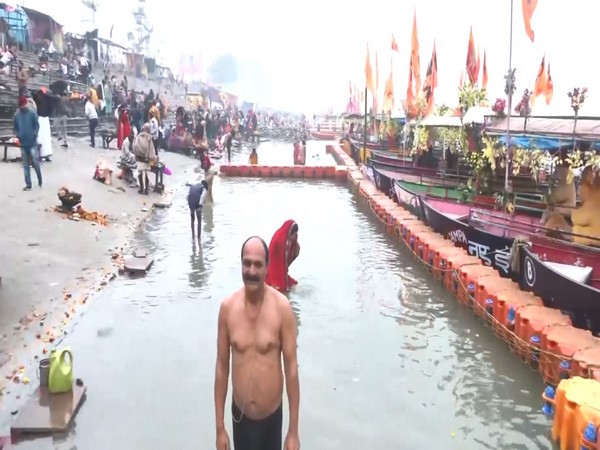Devotees take holy dip at Ayodhya's Saryu Ghat on the occasion of Makar Sankranti