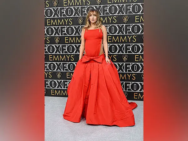 Suki Waterhouse flaunts baby bump in backless red gown 75th Emmys