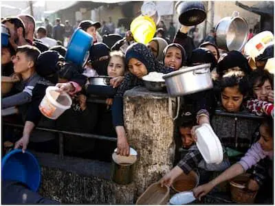 At least 20 people killed, 155 injured in shelling while awaiting food aid in Gaza: Report