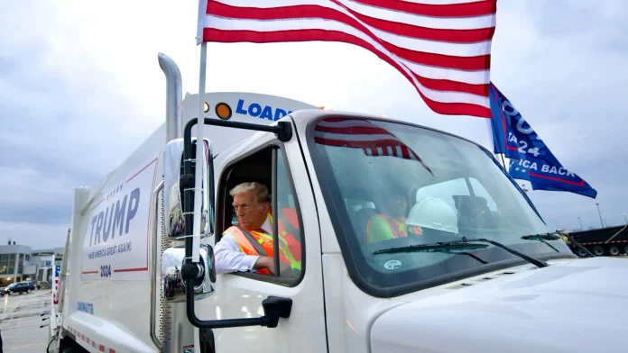 Trump Rides on ‘Garbage Truck’ in Wisconsin Rally, Mocking Biden’s ‘Garbage’ Remarks