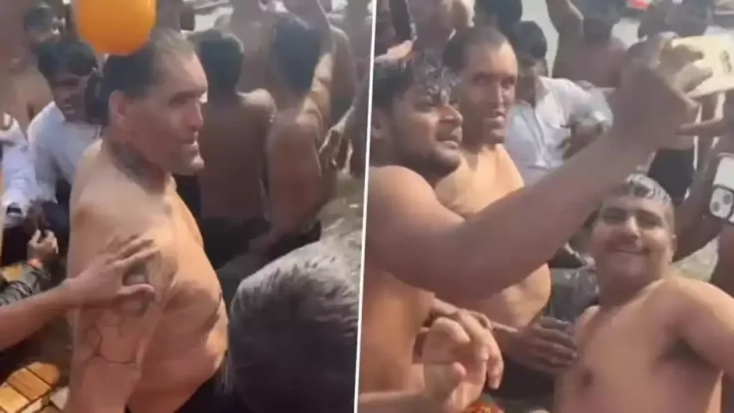 The Great Khali Takes Holy Dip In Triveni Sangam At Mahakumbh