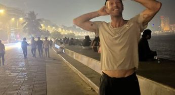 Chris Martin Strikes A Pose In Mumbai Before Coldplay’s India Tour: “Happy and Grateful to Be Here”