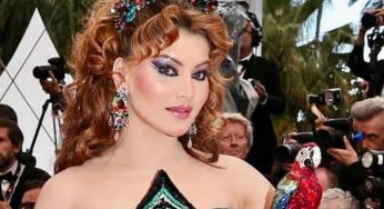 Urvashi Rautela Brings Color and Glamour to Cannes 2025 with Rs 4 Lakh Parrot Clutch