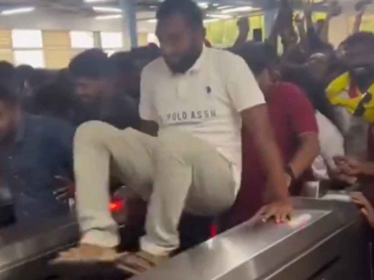 Shocking! Viral Video Shows RCB Fans Jumping Metro Gates on Deadly Bengaluru Stampede Day
