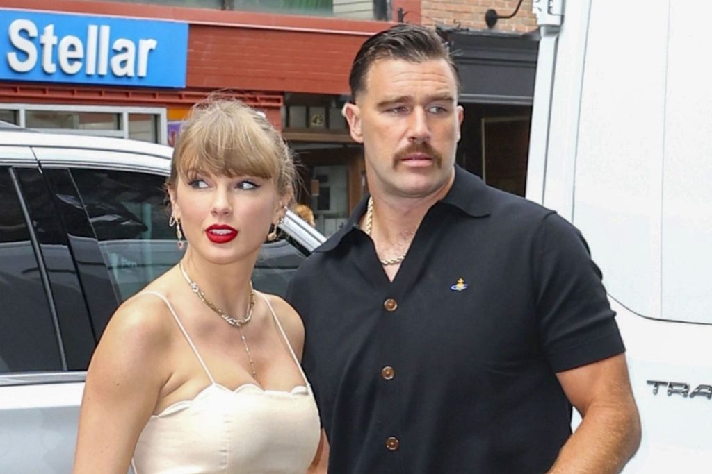 Are Taylor Swift and Travis Kelce the Cutest Wedding Guests Ever?