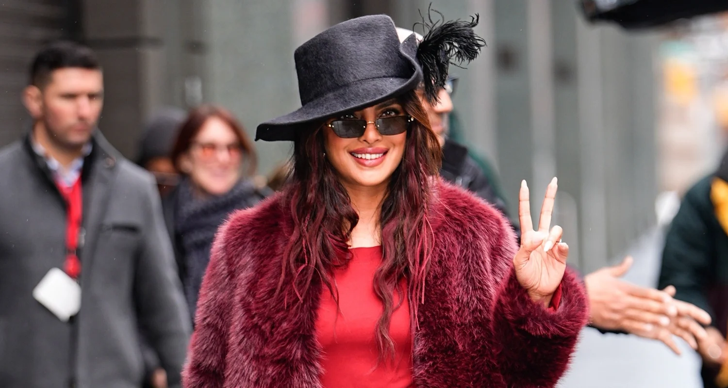 Priyanka Chopra Channels Pirate-Core In Burgundy Fur Coat & Feather Hat