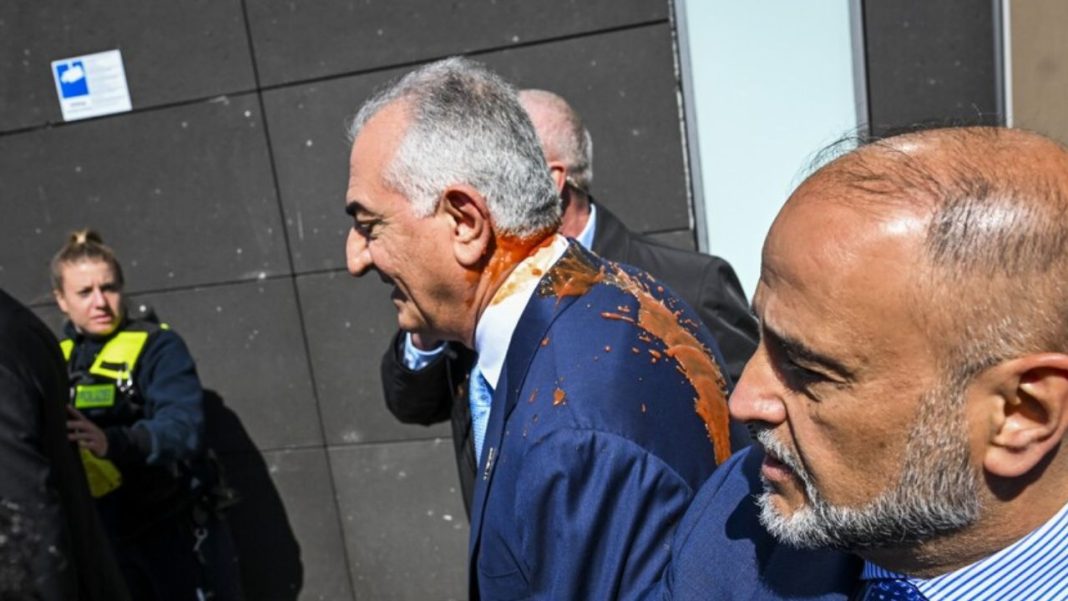 Red Liquid Thrown at Reza Pahlavi in Germany