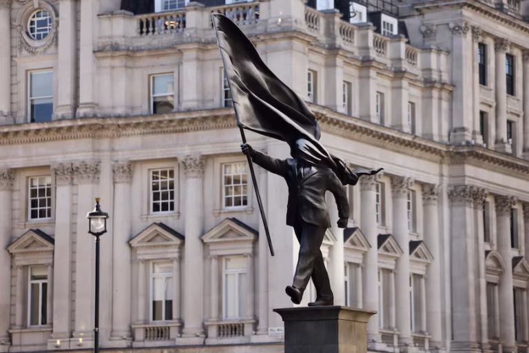 Artist Banksy Confirms A New Statue In London Of A Man Blinded By A Flag
