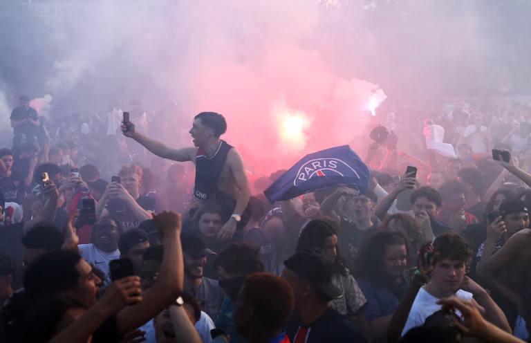 Paris Streets Turn Chaotic As PSG Fans & Police Clash Following Historic UCL Win Over Arsenal