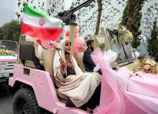 Iran Holds Mass Weddings For Couples Pledging ‘Self-Sacrifice’ In War Against US, Israel Iran Holds Mass Weddings For Couples Pledging ‘Self-Sacrifice’ In War Against US, Israel