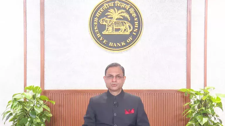 # RBI Governor Says It Is Too Early To Talk About Rate Hikes, Signals Wait-And-Watch Approach Reserve Bank of India (RBI) Governor Sanjay Malhotra has indicated that discussions around a possible interest rate hike are premature at this stage, emphasizing that the central bank will continue to closely monitor economic data before making any policy decisions. Speaking in a recent interview, Malhotra said the Monetary Policy Committee (MPC) opted to maintain a neutral policy stance during its June meeting due to ongoing uncertainty surrounding inflation, economic growth, geopolitical developments and global market conditions. ## Why The RBI Is Not Considering A Rate Hike Right Now The governor explained that if the RBI believed a rate increase was likely in the near future, the MPC would have shifted its stance from "neutral" to "restrictive." Since that did not happen, it signals that the central bank remains in observation mode rather than preparing for immediate monetary tightening. Earlier this month, the MPC kept the repo rate unchanged at 5.25%. At the same time, it slightly lowered India's FY27 growth forecast from 6.9% to 6.6% while revising inflation projections upward due to global uncertainties. ## Global Uncertainty Remains The Biggest Concern According to Malhotra, the biggest challenge facing the Indian economy over the next 12 to 18 months is global uncertainty. Factors such as: * Geopolitical tensions * Supply-chain disruptions * Energy price fluctuations * Global trade uncertainties * Weather-related risks continue to create volatility in financial markets and economic forecasts. Despite these concerns, the governor expressed confidence in India's economic fundamentals, highlighting the country's strong banking system, healthy macroeconomic indicators and resilient financial sector. ## RBI's Stand On The Rupee The governor also reiterated that the RBI does not target any specific exchange rate for the Indian rupee. Instead, the value of the currency is largely determined by market forces. The central bank intervenes only when excessive volatility threatens market stability. This approach allows the rupee to adjust naturally to global economic developments while ensuring orderly market conditions. ## Inflation Still Under Watch While headline inflation remains below the RBI's medium-term target of 4%, the central bank remains cautious. Malhotra noted that: * Headline inflation is currently below 4% * Core inflation remains around 2.4% * Retail inflation rose to 3.93% in May from 3.48% in April The RBI is particularly watching whether rising fuel and energy costs begin affecting the prices of other goods and services. At present, the central bank has not observed significant second-round inflationary effects. However, it remains prepared to act if price pressures become more widespread across the economy. ## What It Means For Borrowers And Investors For now, borrowers can take comfort in the fact that an immediate increase in interest rates appears unlikely. Home loan, vehicle loan and business borrowing costs are expected to remain stable in the near term unless inflationary pressures intensify significantly. Investors, meanwhile, should continue monitoring inflation trends, crude oil prices, monsoon developments and global economic conditions, as these factors are likely to influence the RBI's future policy decisions. ## Bottom Line The RBI has made it clear that it is not currently preparing for a rate hike. Instead, the central bank is adopting a cautious wait-and-watch strategy while closely tracking inflation, growth and global developments. With inflation still relatively contained and economic uncertainties persisting, policymakers appear focused on maintaining stability rather than tightening monetary conditions prematurely.