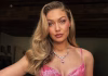Gigi Hadid Channels A Pink Soft Serve Ice Cream For Taylor Swift’s Wedding Gigi Hadid Channels A Pink Soft Serve Ice Cream For Taylor Swift's Wedding