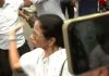 Mamata Banerjee Slaps Man Amid TMC-BJP Clash Outside Residence Mamata Banerjee Slaps Man Amid TMC-BJP Clash Outside Residence