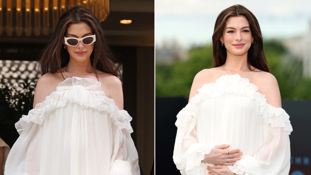 Anne Hathaway Is Encased In Ruffles For The Odyssey Tour In London