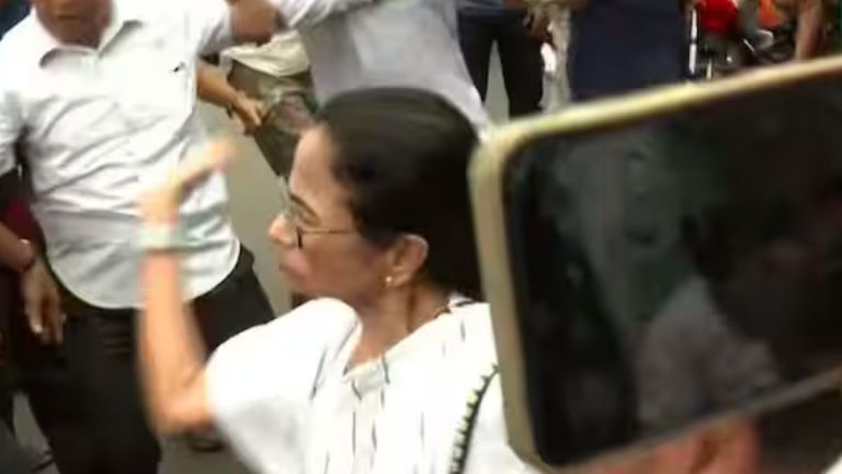 Mamata Banerjee Slaps Man Amid TMC-BJP Clash Outside Residence